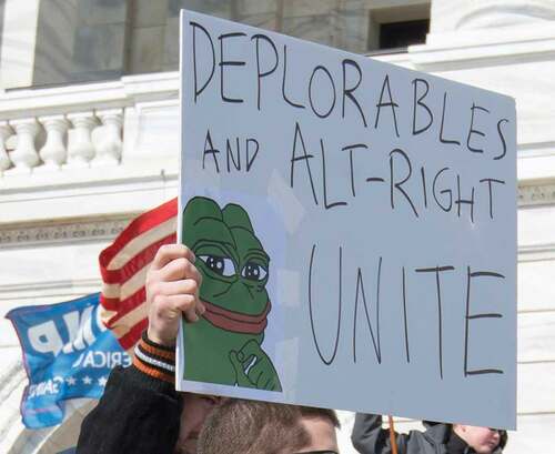Figure 1. Drawing of Pepe the Frog on a protest board of Trump supporters at the 'March 4 Trump' rally in Saint Paul, Minnesota. Detail of photo by Fibonacci Blue, Wikimedia Commons.