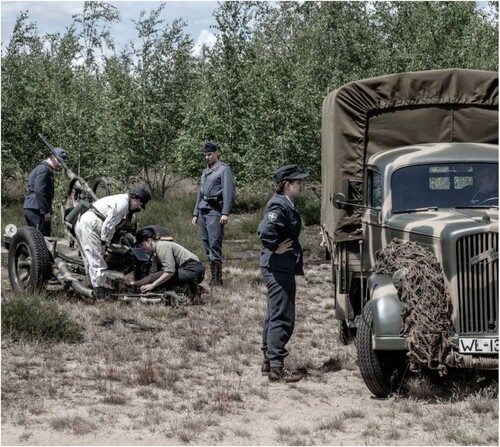 Figure 2. Flakhelferinnen and 277 Volksgrenadierdivision performing a vehicle issue. Photo by Michiel Peeters.