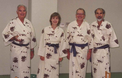 1. (Colour online) Formal dinner photograph dating from the International Liquid Crystal meeting in Japan in 2000. From left to right, Zeev Luz, Carol Shumate, Herbert Zimmermann and Ed Samulski.