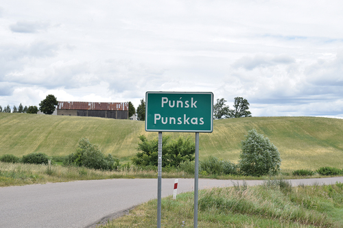 Figure 5. A bilingual (Polish above, Lithuanian below) official town name billboard of Puńsk. © [Gintarė Kudžmaitė].