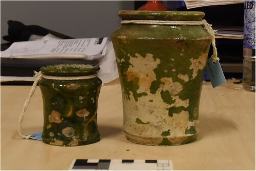 Figure 11. Two albarello containers from the Estonian Nargen 1 wreck. The smaller one has an identical counterpart in the Esselholm wreck. Photo: Riikka Tevali.