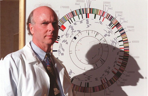 Figure 3. J. Graig Venter posing before the gene map of Haemophilus influenza (1995).