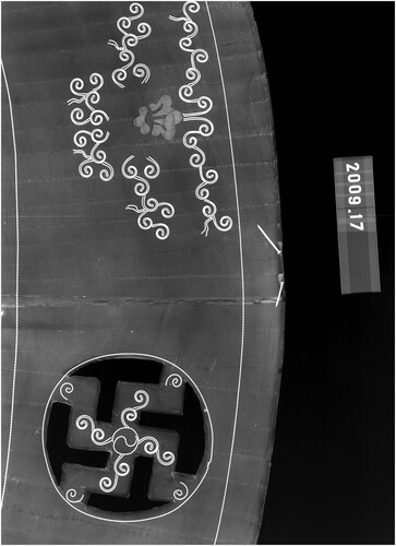 Figure 4. X-radiograph of the round table. This section is from the skirt of the table. The thin, nearly equally spaced horizontal lines are the saw cuts in the wood that allow for the table’s round structure. Image © Asian Art Museum of San Francisco. Parameters: 40 kV, 3 mA, 78 s, 40 inches SID.