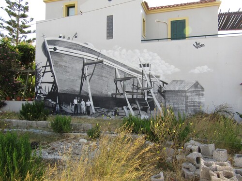 Figure 17. Murals commemorating shipbuilding at Ormos Marathokampou. (Author)