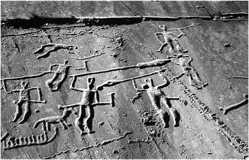 Figure 13. A close-up image of the horned figures of the Bro Utmark panel. Comparing the central figure on the left to the Järrestad figure, one can observe a similar leg position which gives off the impression of built-up tension—as if the figure were about to leap. This suggests that not all of the figures depicted were stationary. Overall, paired with the acrobat placed above them and the particular emphasis which all show in waving their weapons, a general impression of motion is given off. (Swedish Rock Art Research Archives 2015)