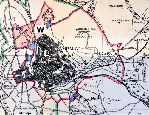 Figure 1. W = Wandegeya. Kololo, Naguru and Nakawa, the focus of May’s Kampala Extension Plan (1947) at top centre and top right. Kampala Township boundary in red. Land acquired from mailo and added to Township between 1938 and 1948 marked in blue (UNA.71/C464) (colour online only).