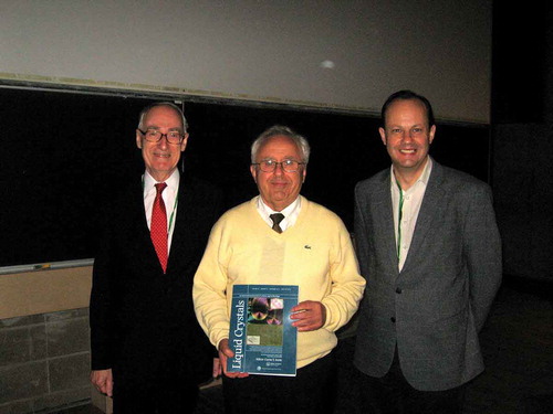 Figure 1. (colour online) Geoffrey Luckhurst (left) presenting Pawel Pieranski (centre) with the 2013 Luckhurst-Samulski Prize, and the Editor Corrie Imrie (right).