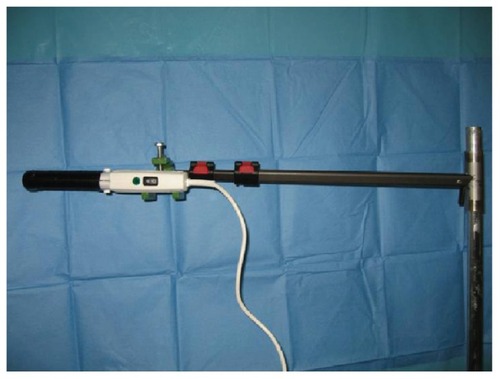 Figure 2 Ultraviolet A lamp held by a clamp mounted on an intravenous pole.