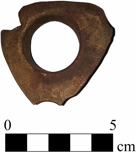 Figure 10. Three-lobed copper pulley coak recovered from the Boot Reef shipwreck (photo: Kieran Hosty).