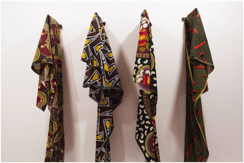 Figure 13 Installation view (detail) of East African khanga cloth in Migrations, Huddersfield Gallery of Art, England (October 22, 2016 – January 21, 2017).