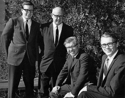 Fig. 3. Robert V. Wagoner, William A. Fowler, Fred Hoyle, and Donald D. Clayton in February 1967, between Sloan Laboratory and West Bridge Laboratory on the Caltech campus.