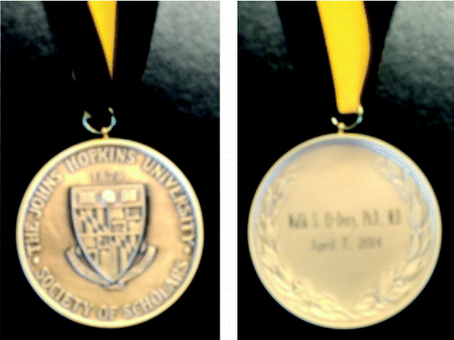 Figure 2. Medallion given to Dr El-Deiry during the Johns Hopkins University Society of Scholars award ceremony in Baltimore, Maryland on April 7, 2014.