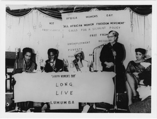 All African Women’s Day, 1961. Claudia is seated at the far left, while Eslanda Goode Robeson speaks. Image sourced from the New York Public Library, shelfmark b16060681.