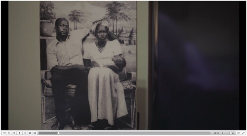 Figure 3 A photograph of Dr Garang and his wife, Rebecca, holding their child. It shows a private family moment during pre-Independence struggles. (Screen freeze-frame from No Simple Way Home). Accessed from Afri Docs’ (@AfriDocs)—https://youtu.be/90m7gpKKnqU