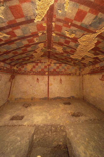 Figure 3. Textiles are desirable for their expense and exclusivity. This colourful, patterned pavilion painted in the Tomb of the Hunter, Tarquinia, 550 BC, shows the attention of the painter to enhance the tomb with splendid textiles. With its dyed panels and animal frieze, real versions of a large textile canopy like this would have required a substantial amount of work, skill and resources. Such canopies were likely expensive to make, and so exclusive, desirable items (© MIBACT. Museo Nazionale Etrusco di Villa Giulia – Roma. Foto Mauro Benedetti).