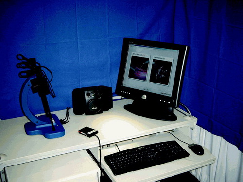 Figure 1. LapSim® device with the Immersion Medical interface and a graphic display of the clip application on the monitor.