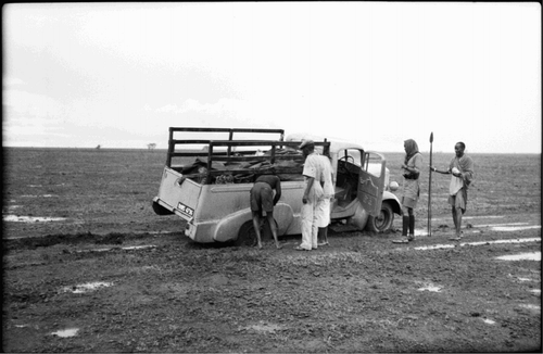 Figure 1. Anthropologist Paul Baxter's Car stuck in the mud somewhere between Marsabit and Moyale. Circa. 1952. Copyright Pitt Rivers Museum, University of Oxford. Accession no.: 2008.2.2.565.