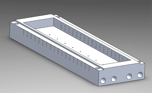 Figure A2. The water-cooled sample holder used in this study. Continuous water cooling was provided through the four holes passing through the length of the sample holder. Additional holes were milled through the sides of the sample holder to insert the thermocouples in-depth within the solid.