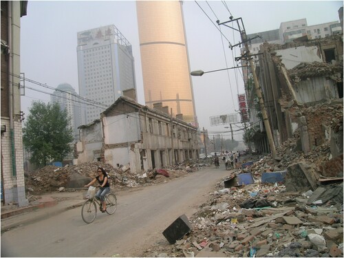 FIGURE 1. Demolition of urban housing and chai as a narrative of transition and the promise of life improvement in Tianjin. Source: Dennis Zuev (2008).