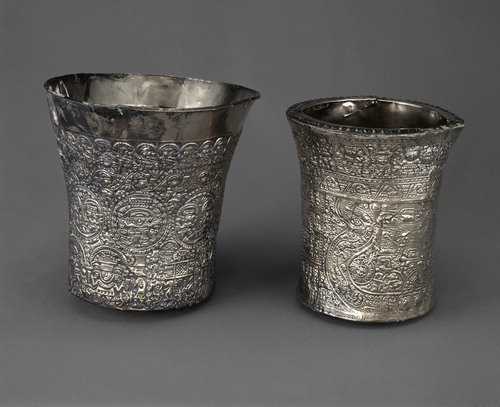 Figure 1. Two Lambayeque silver beakers in the collection of the Denver Art Museum (left, 1969.303; right, 1969.302). Photograph courtesy Denver Art Museum.