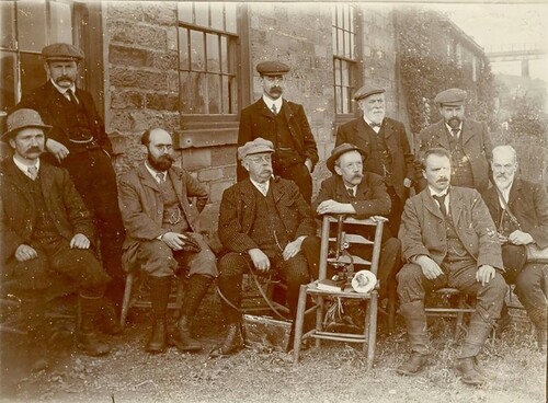 Figure 1. Photograph from a YNU Foray in 1913. Seated behind the microscope is George Massee, and stood behind him is Charles Crossland. To the right of the microscope is Arthur Edward Peck and next to him is William Norwood Cheesman. Reproduced with permission of the Tolson Memorial Museum, Huddersfield.