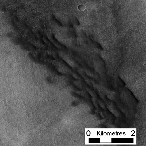 Figure 7. Dark dunes located around the north and northeast side of the central peak.