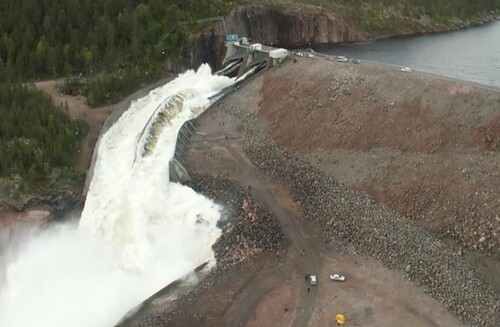 Figure 1. Aeration phenomenon (white water) in a prototype spillway during flood discharge (image by James Yang).
