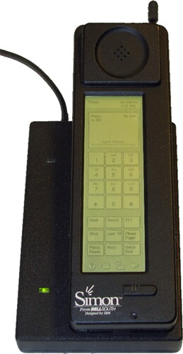 FIGURE 5 The IBM Simon Personal Communicator and its charging base. This device is recognized as one of the first smartphones, integrating mobile phone and PDA functions. Photo taken on June 30, 2012, by Bcos47 and released into the public domain. The image was originally published on October 15, 2009, and accessed through Wikipedia.