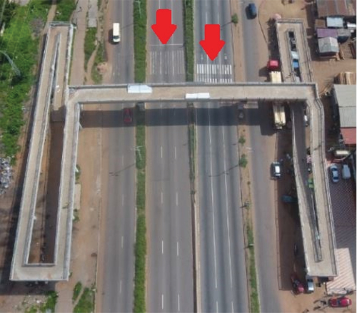 Figure 3. Redundant pedestrian crosswalks under a footbridge at the Madina- Adenta Highway.