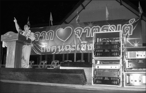 Former deputy prime minister Chaturon Chaisaeng speaks at a rally held behind the vocational college of Chachoengsao, along the Bang Pakong river. Leaflets posted in the area read, “Fair elections are the solution for Thailand.” (Credit: Michael H. Nelson, 2007)