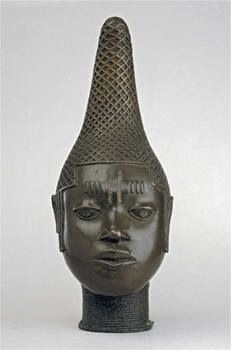 Figure 1. Thought to represent Queen Mother Idia, the eyes of this bust are inlaid with iron. Brass commemorative head, Edo, Benin City, early sixteenth century. British Museum No. Af1897,1011.1. Courtesy of the Trustees of the British Museum (CC BY-NC-SA 4.0).