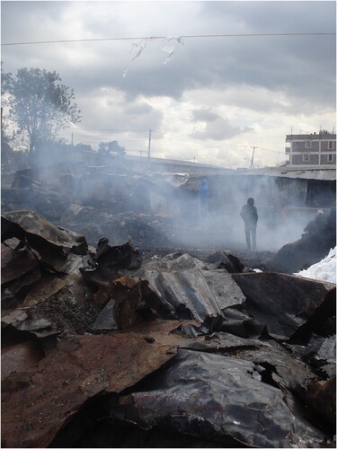 Figure 1. Still smoking ruins from house fire in Bondeni, Mathare in 2014. Picture taken by Author.