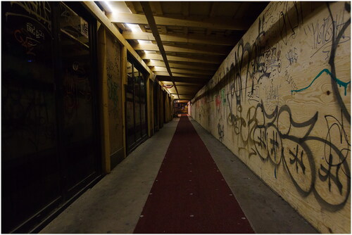 Figure 11. More graffiti tags on plywood structures, walls, and windows (on Eerikinkatu). Source: Photograph taken by author.