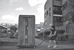 Figure 6. Serena Korda, The Library of Secrets, 2007, olive and teak cabinet, books. Photo Tai Shani