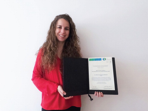 Figure 5. Recipient of the 2019 young researcher Excellence Award in Thermodynamics and Transport Properties: Mónia A. R. Martins, University of Aveiro, Portugal (presented by Carlos Nieto, EFCE representative).