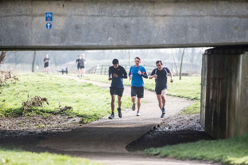Figure 2. Milton Keynes: runners using a redway passing under a road bridge (Photo courtesy of The Parks Trust, Milton Keynes)