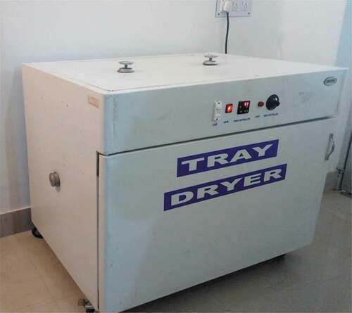 Figure 1. Laboratory scale cabinet hot-air dryer