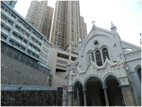 Figure 2. The Hong Kong Catholic Cathedral of the Immaculate Conception, a large building well visible between the tall edifices of Hong Kong Island. Photograph by author.